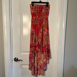 CRISTINA DRESS! Red/Orange Paisley print. Polyester and spandex material.